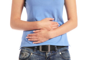 Verstopfung bei einer Frau vor der Menstruation